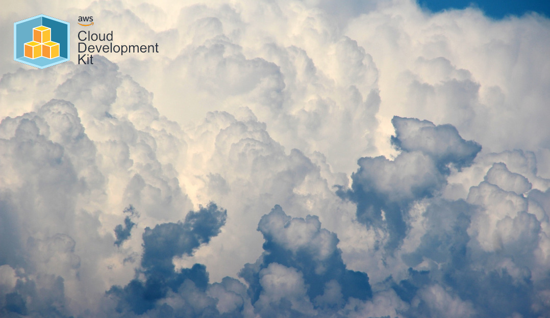 A cloudscape with the AWS CDK logo